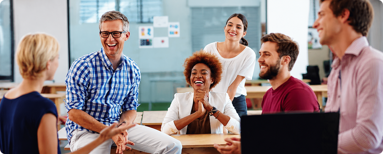 A diverse team celebrating a successful discussion